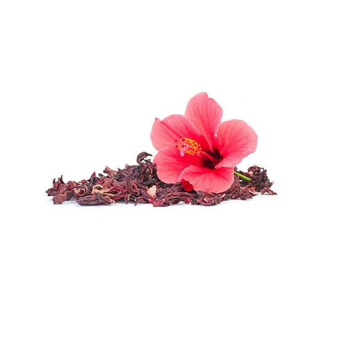 Dried hibiscus petals brewed into tea, vibrant red herbal infusion.