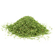 Dried parsley flakes with fine green texture, used as a culinary seasoning.