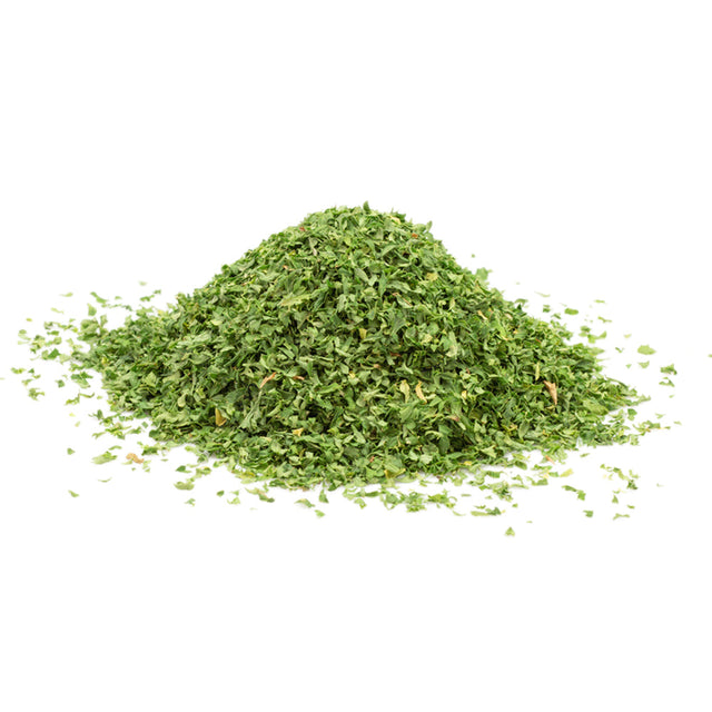 Dried parsley flakes with fine green texture, used as a culinary seasoning.