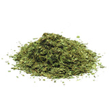 Dried tarragon leaves with fine texture, aromatic herb used in cooking and seasoning.
