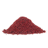 Ground sumac spice with deep red color, tangy and aromatic seasoning.